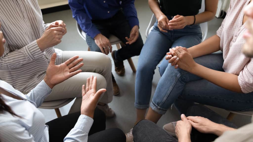 Top Close Up View In Circle Sit People for Group Therapy